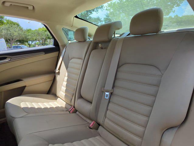 Photo of 2014 Sunset Metallic Ford Fusion