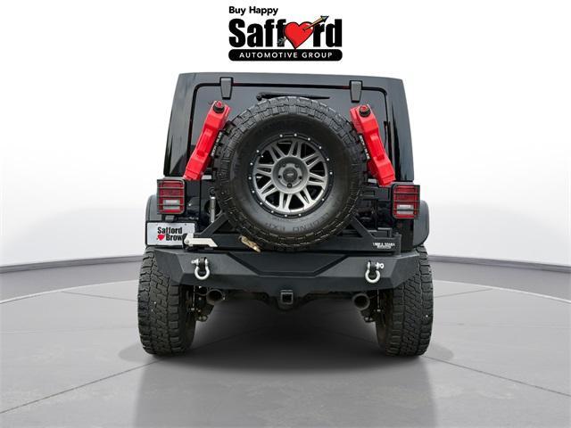 Photo of 2015 Black Clearcoat Jeep Wrangler Unlimited
