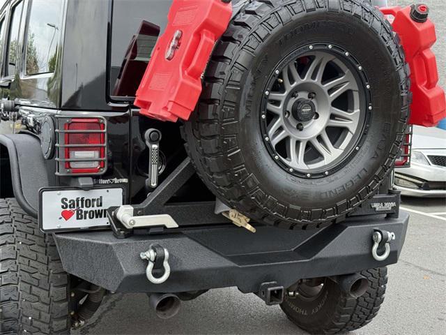 Photo of 2015 Black Clearcoat Jeep Wrangler Unlimited