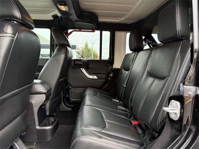 Photo of 2015 Black Clearcoat Jeep Wrangler Unlimited