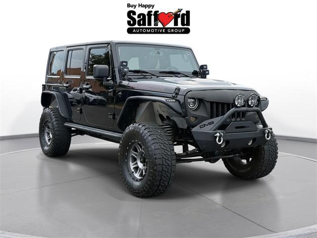 Photo of 2015 Black Clearcoat Jeep Wrangler Unlimited
