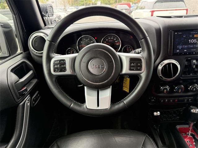 Photo of 2015 Black Clearcoat Jeep Wrangler Unlimited