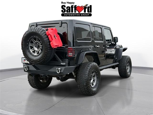 Photo of 2015 Black Clearcoat Jeep Wrangler Unlimited