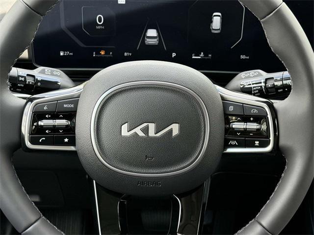 Photo of 2025 Ivory Silver Kia Carnival