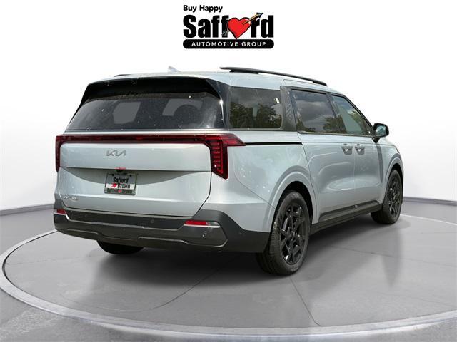 Photo of 2025 Ivory Silver Kia Carnival