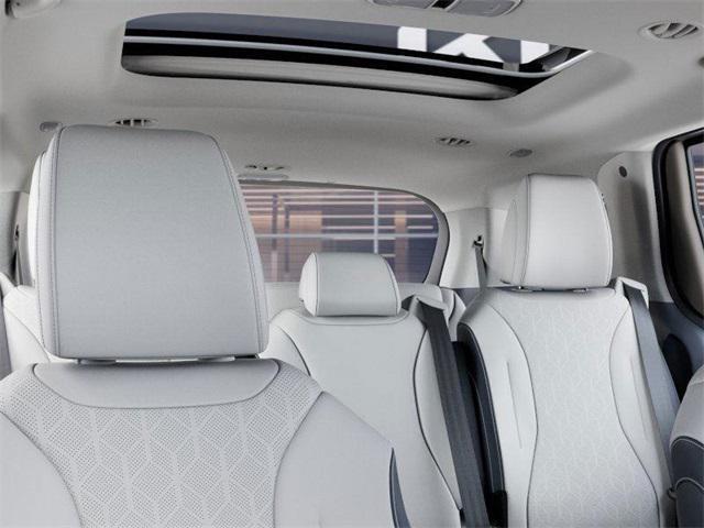 Photo of 2026 Ceramic White Kia Carnival Hybrid