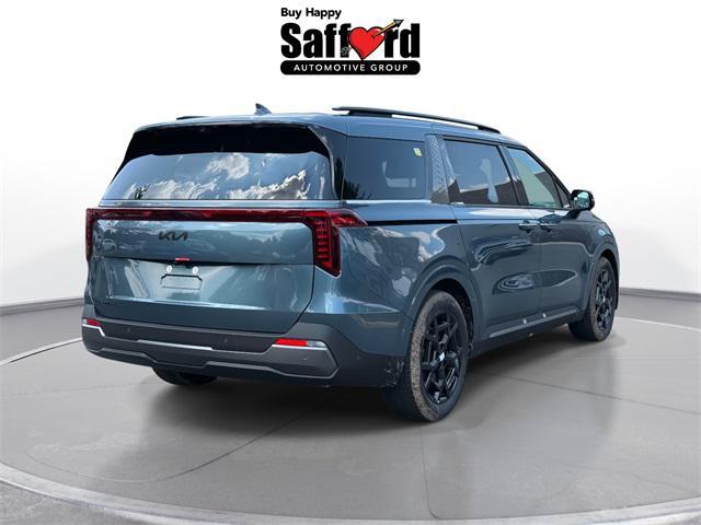 Photo of 2026 Astra Blue Kia Carnival