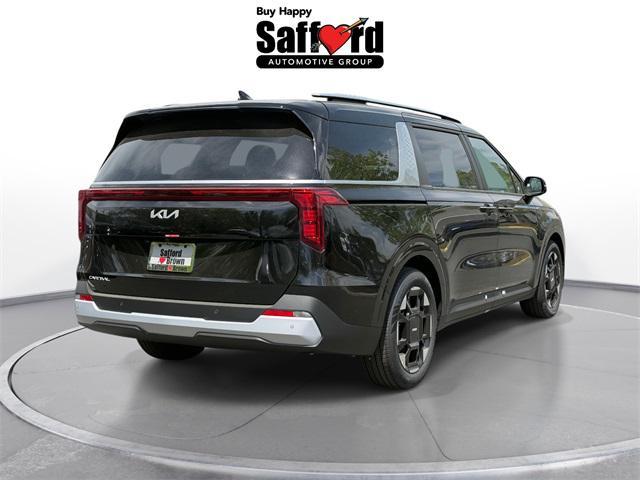 Photo of 2025 Aurora Blue Kia Carnival