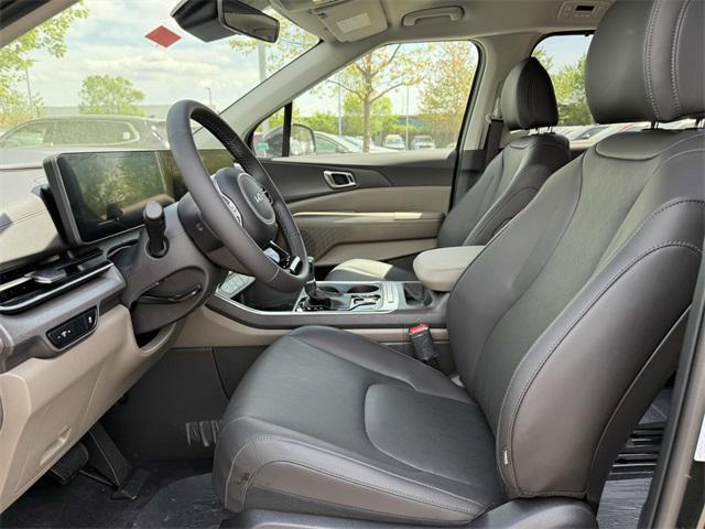 Photo of 2025 Aurora Blue Kia Carnival