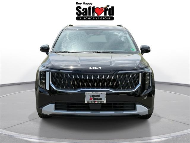 Photo of 2025 Aurora Blue Kia Carnival