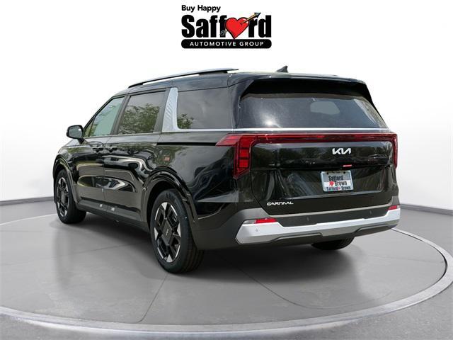 Photo of 2025 Aurora Blue Kia Carnival