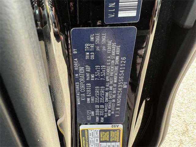 Photo of 2025 Aurora Blue Kia Carnival