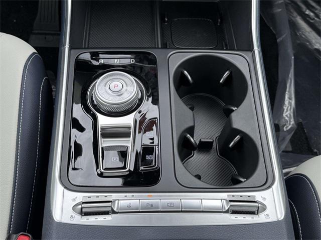 Photo of 2026 Ceramic White Kia Carnival Hybrid