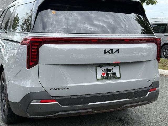 Photo of 2026 Ceramic White Kia Carnival Hybrid