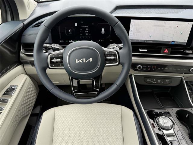 Photo of 2026 Ceramic White Kia Carnival Hybrid