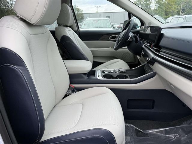 Photo of 2026 Ceramic White Kia Carnival Hybrid