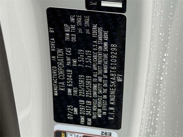 Photo of 2026 Ceramic White Kia Carnival Hybrid