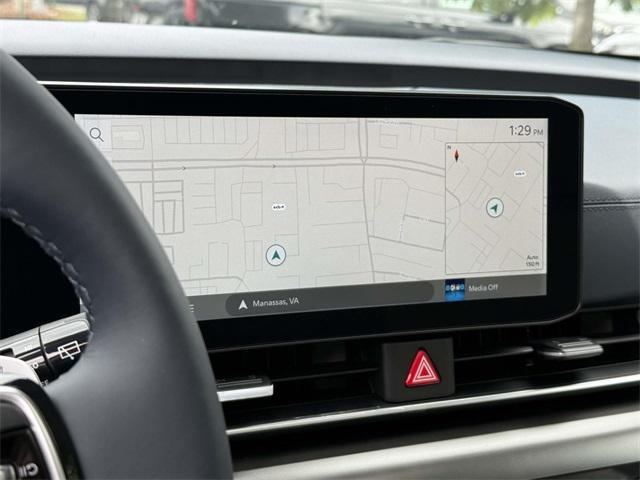 Photo of 2026 Ceramic White Kia Carnival Hybrid