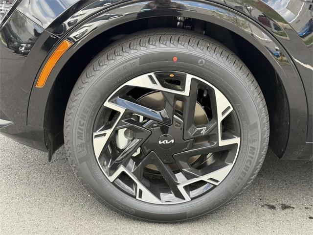 Photo of 2025 Ebony Kia Sportage