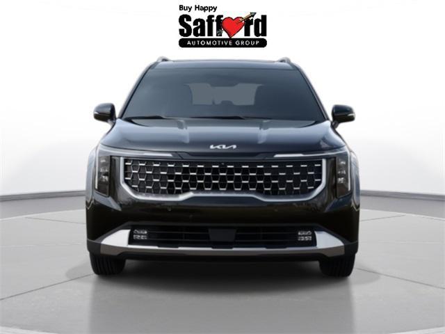 Photo of 2026 Aurora Blue Kia Carnival Hybrid