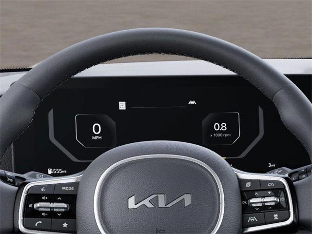Photo of 2026 Aurora Blue Kia Carnival Hybrid