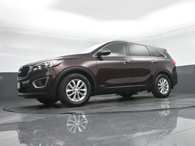 Photo of 2016 Dark Cherry Kia Sorento