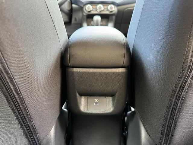 Photo of 2025 Aspen White Tricoat Nissan Versa