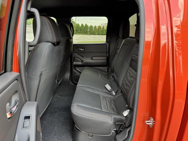 Photo of 2025 Afterburn Orange Nissan Frontier