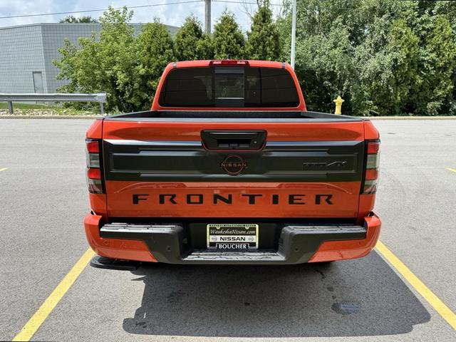 Photo of 2025 Afterburn Orange Nissan Frontier
