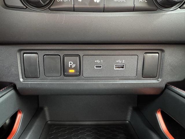 Photo of 2025 Afterburn Orange Nissan Frontier