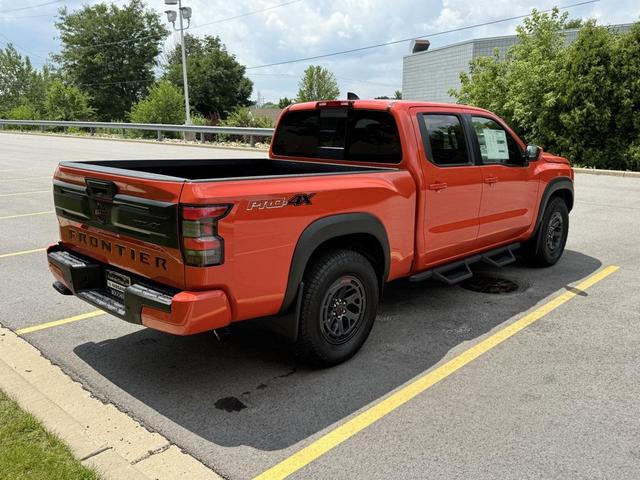 Photo of 2025 Afterburn Orange Nissan Frontier