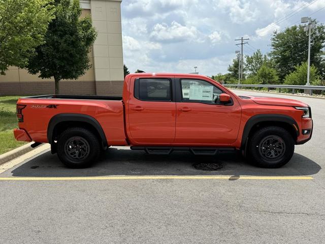 Photo of 2025 Afterburn Orange Nissan Frontier