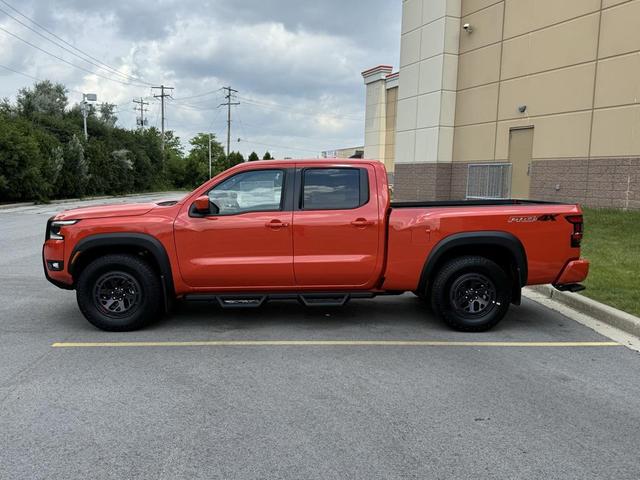 Photo of 2025 Afterburn Orange Nissan Frontier
