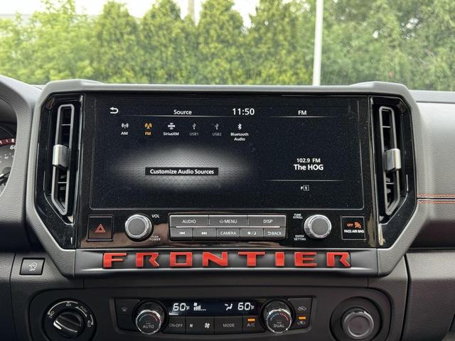 Photo of 2025 Afterburn Orange Nissan Frontier