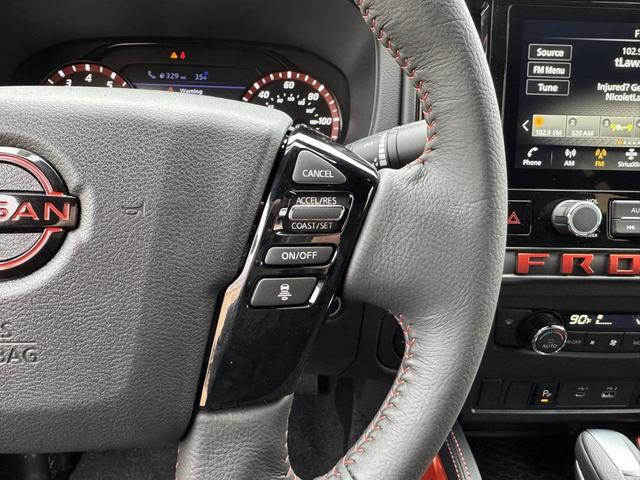 Photo of 2025 Afterburn Orange Nissan Frontier
