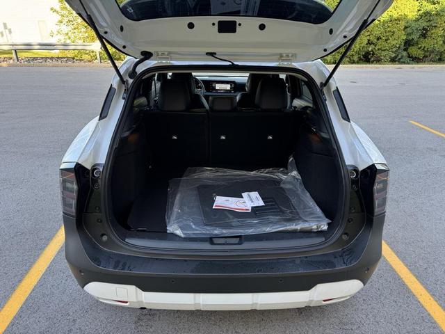 Photo of 2026 Aspen White Tricoat Nissan Kicks