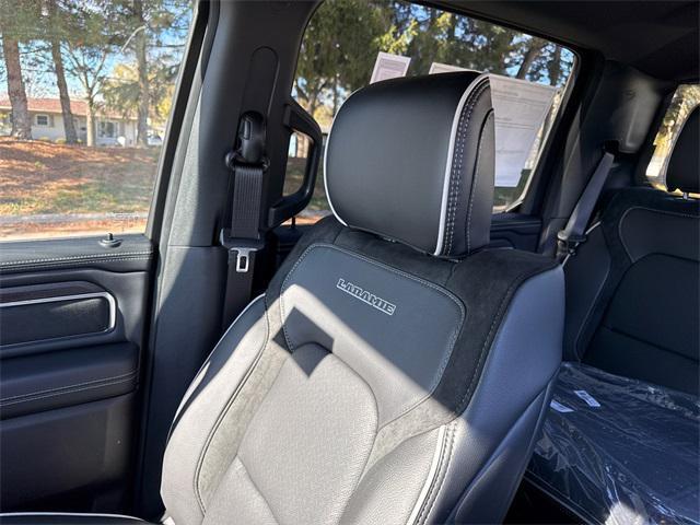 Photo of 2025 Diamond Black Crystal Pearlcoat RAM 1500