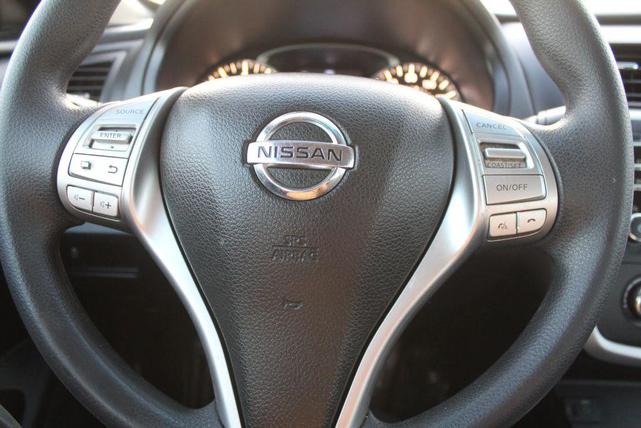 Photo of 2016 Super Black Nissan Altima