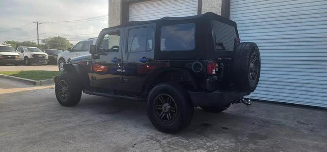 Photo of 2016 Black Clearcoat Jeep Wrangler Unlimited