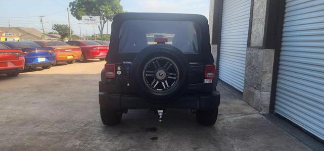 Photo of 2016 Black Clearcoat Jeep Wrangler Unlimited