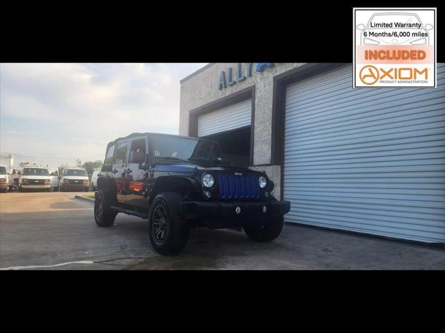 Photo of 2016 Black Clearcoat Jeep Wrangler Unlimited