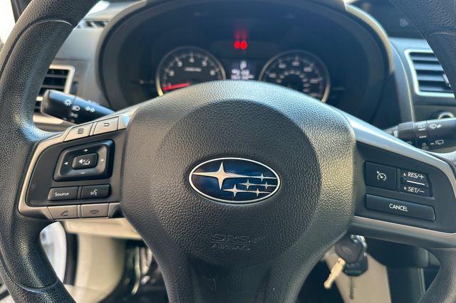 Photo of 2016 Crystal White Pearl Subaru Impreza