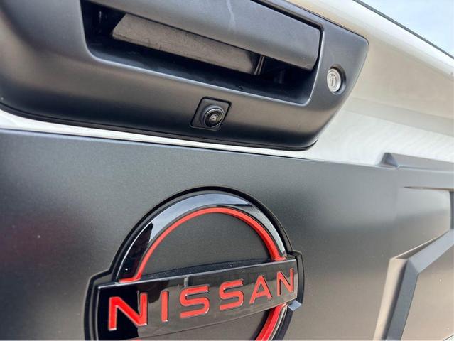 Photo of 2024 Glacier White Nissan Titan