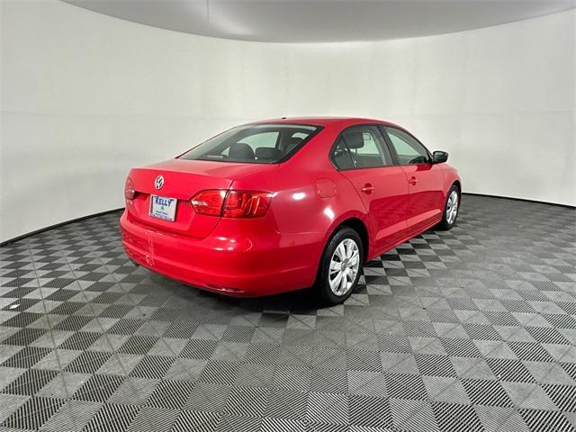 Photo of 2013 Tornado Red Volkswagen Jetta