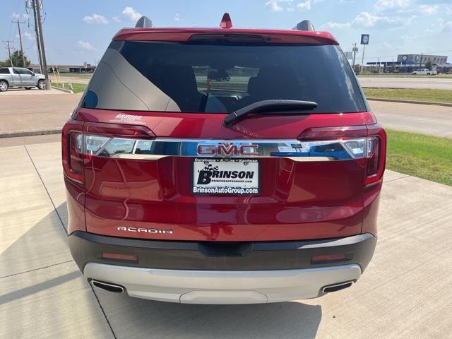 Photo of 2023 Volcanic Red GMC Acadia