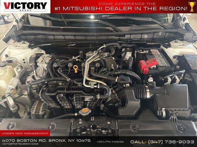 Photo of 2022 Pearl White Tricoat Nissan Altima