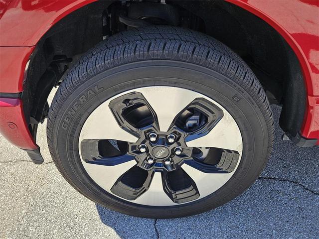 Photo of 2023 RAPID RED MET TINTED CC Ford F-150 Lightning
