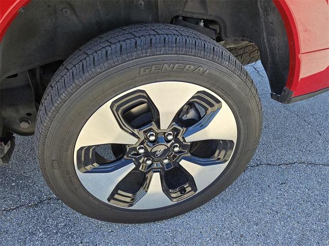 Photo of 2023 RAPID RED MET TINTED CC Ford F-150 Lightning