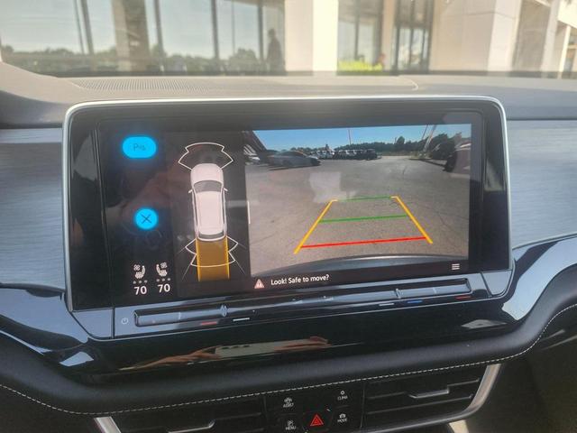 Photo of 2024 Aurora Red Metallic Volkswagen Atlas Cross Sport