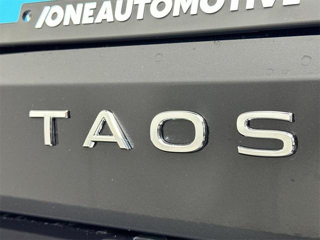 Photo of 2025 Deep Black Pearl Volkswagen Taos